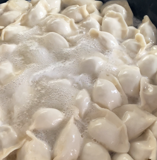 仿手工餃子機做出來的餃子 仿手工餃子機做出來的餃子